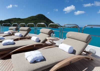 Beautiful Chaise lounge chairs with island and open seas designed by Fort Lauderdale yacht designer Patrick Knowles